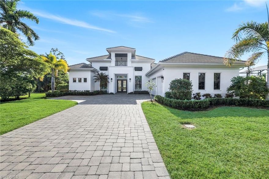 Experience refined living in this exceptional Wildcat Run residence, showcasing the coveted Muirfield floor plan by STOCK. Set on a private cul-de-sac with sweeping lake and golf course views, this elegant home features 4 bedrooms plus a den, 3.5 baths, and a spacious 3-car garage.  Crafted with Stock’s award-winning design and quality, the home boasts a luxury kitchen with upgraded cabinetry, quartz countertops, JennAir stainless steel appliances, a gas cooktop, wine cooler, and beverage refrigerator. An inviting den offers the perfect home office setting, while elegant tile flooring enhances the main living areas and rich hardwood floors elevate each bedroom. Designed for the ultimate Southwest Florida lifestyle, the outdoor living space is truly exceptional. Enjoy the stunning saltwater pool and spa powered by a new upgraded Titanium heater that warms the spa
quickly for effortless relaxation anytime. The covered lanai is ideal or entertaining, complete with a Sonos system, sophisticated outdoor kitchen, and cozy fireplace—all overlooking picturesque water and fairway vistas.  Wildcat Run residents enjoy an impressive array of amenities, including pickleball, bocce, tennis, a state-of-the-art fitness center, and two onsite restaurants. Golf enthusiasts will appreciate the option to join the renowned Wildcat Run golf club. Perfectly located just minutes from Southwest Florida International Airport (RSW), this home is ideal for frequent travelers or those welcoming visiting guests. Don’t miss the opportunity to own your piece of paradise in Wildcat Run.