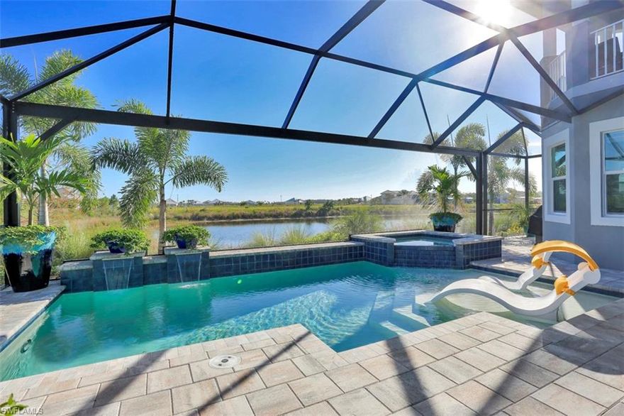 Immediate Availability in Isles of Collier Preserve! Seller has only occupied the property since August & job relocation forces the sale. No expenses spared!  Save money, time & hassle buying this home already complete & move in ready! Additional finishing touches such as elegant light fixtures & custom window coverings thru-out. Gourmet outdoor kitchen recently completed w/ gas grill, green egg, hibachi stovetop, sink, refrigerator w/ ice maker & TV overlooking the beautiful pool & fully fenced landscaped yard. Enjoy your permanent vacation with a grand entrance, a huge open kitchen w/ panoramic views of the pool, an oversized master bedroom w/ electric window coverings, his/hers closets & spacious bathroom.  The additional upper-level entertaining area offers a large balcony with breathtaking waterfront views.  Low HOA that offers a beautiful clubhouse, fitness center, resort style pool, tennis, pickleball, restaurant, hiking, 8 miles of scenic kayaking, paddle boarding & catch and release fishing.  Available for immediate occupancy fully furnished plus a one year home warranty! Move in & enjoy the Florida lifestyle without the hassle of buying a blank canvas.