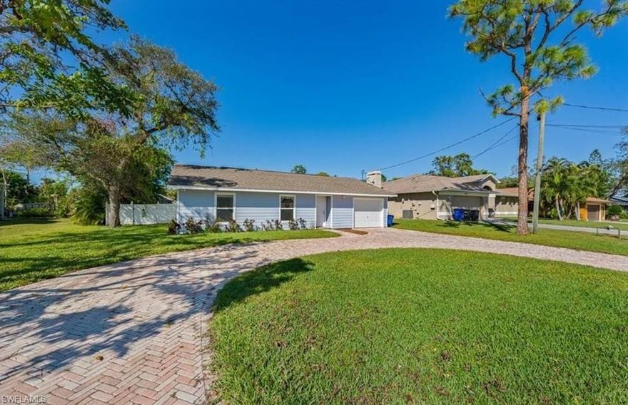 Welcome Home to Bonita Springs! Enjoy this updated 3 bedroom/2 bathroom single family home offering a large fenced in backyard, an oversized 1-car garage, with enough room for an easy access laundry area and plenty of storage space for bicycles and such.