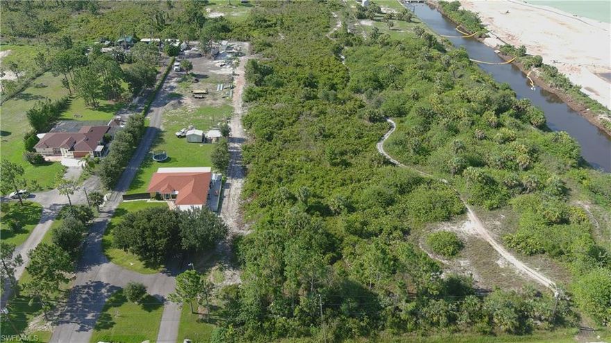 100% Upland 1.14 acres located on the north side of 37th Avenue NE. No wetland permit required! You won’t find a more attractively priced upland lot in the estates especially with a location like this. Just 2 streets north of the Oil Well Road on Everglades Blvd. Lot is almost to the end of the street. Vanderbilt Extension is planned to extend out to Everglades so a trip to the beach will be in  a few short minutes. Collier County is also planning a new park on the Vanderbilt Beach extension as well as a school. DEP report on file.