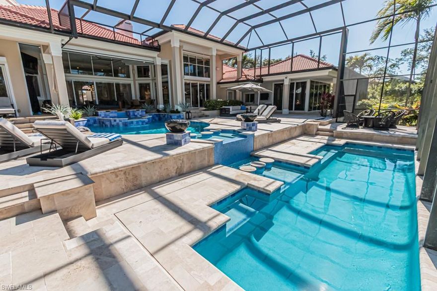 Welcome to an extraordinary 6460 square foot estate set within the prestigious gated community of Quail West. This exceptional residence offers 4 spacious bedrooms, 6 bathrooms, and a thoughtfully designed floor plan that blends elegance, comfort and functionality. From the moment you enter, you're greeting by soaring ceilings, stunning marble floors and an abundance of natural light that highlights the homes sophisticated finishes. The expansive living spaces flow effortlessly, creating the perfect setting for both intimate gatherings and grand entertaining. A beautifully appointed bar adds a touch of refinement, ideal for hosting in style. The owner's suite is a true retreat, generously sized and designed for ultimate relaxation featuring luxurious finishes and a spa-like atmosphere. Each additional bedroom offers comfort and privacy with en suite baths, while the casita with kitchenette provides a perfect space for visitors extended stays. Step outside to your private resort style backyard, where indoor-outdoor living comes to life! Whether lounging poolside or enjoying serene views this outdoor oasis is designed for year round enjoyment. 
Thoughtfully reimagined, this home has been extensively updated both inside and out within the past 4 years. While the brand new HVAC system, hot water tanks, pool equipment, and electrical upgrades give you peace of mind the completely redesigned owners and guest suites showcase refined finishes for a truly turnkey, like-new living experience! Located in one of Naples most sought after communities, residents of Quail West enjoy world class amenities, championship golf and an unmatched lifestyle of luxury and convenience. Schedule your private showing today!