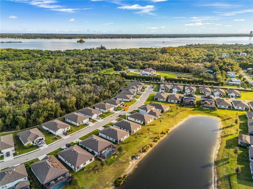 Welcome to 16033 Beachberry Dr, a beautifully appointed single-story home in the heart of North Fort Myers, offering both comfort and scenic tranquility. This 4-bedroom, 2-bath residence features a thoughtfully designed open floor plan that seamlessly connects the living, dining, and kitchen areas, making it ideal for both everyday living and entertaining. Large windows throughout the home invite abundant natural light and showcase the stunning water views, creating a calm and inviting atmosphere. The spacious kitchen is well-equipped with ample cabinetry and counter space, overlooking the main living area so you never miss a moment while hosting family or guests. The split-bedroom layout offers added privacy, with the primary suite tucked away as a true retreat, complete with a generous walk-in closet and an en-suite bathroom. Three additional bedrooms provide flexibility for guests, a home office, or hobby space. Step outside to enjoy peaceful water views that enhance the Florida lifestyle—perfect for relaxing mornings, evening unwinding, or weekend gatherings. The single-story design ensures easy accessibility and convenient living. Located close to shopping, dining, schools, and major roadways, this home combines location, value, and natural beauty. NO CDD with low taxes, making it an even more attractive opportunity. Don’t miss your chance to own this inviting home—schedule your private showing today.