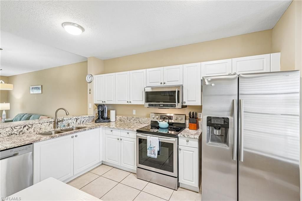Photo of 9185 Celeste DR #1-103, NAPLES, FL 34113 (MLS # 226020532)