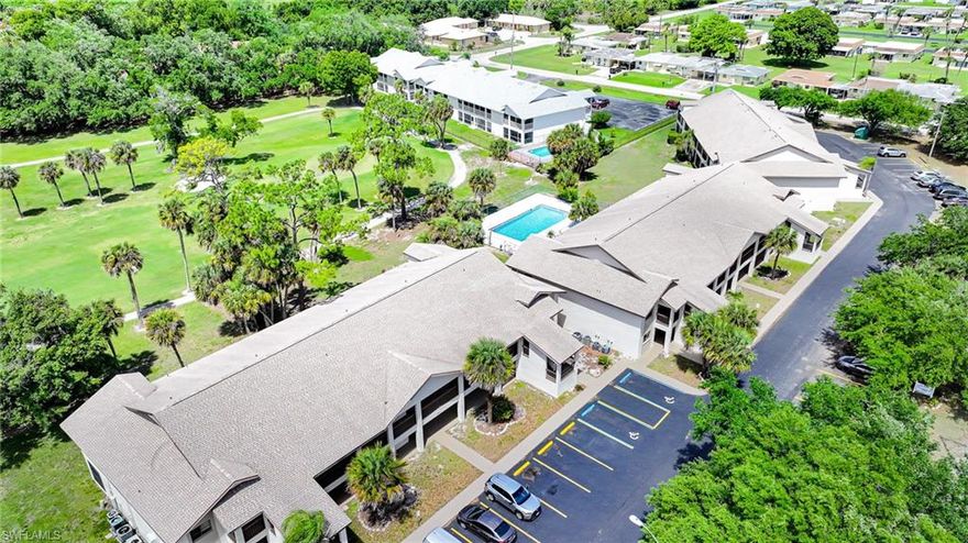 Condo, unit on the second floor, 2 bedrooms and 2 baths  tile floors, screened-in lanai with view to the Admiral Lehigh Golf Club and Resort, also features a swimming pool, and much more.