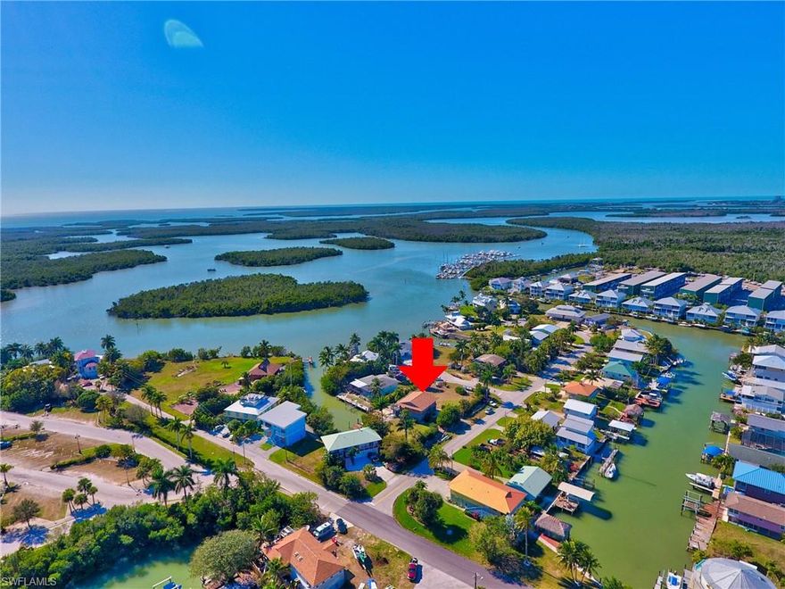 Welcome to paradise, Historic Goodland, offers its residents a laid-back charm unlike any other place in the region. Old Florida fishing village includes some of the greatest fishing in the 10,000 Islands. Located southeast of Marco Island, this quaint little Island is perfect place to enjoy peaceful living. This property is a rare find, 3 lots total on the water, plenty of room for boat dockage, and gulf access. Many opportunities with this great waterfront property, plenty of room to build a new, large dream house, or simply enjoy the two-story home that features 3 bedrooms 1 and half bathrooms, beautiful kitchen and living room facing the water.  Freshly painted interior, new roof in 2018, all appliances under 5 years old, hot water heater 2 years old. Goodland is known for its friendly vibe, great restaurants and has the cutest post office. Boat lover's dream with 3 marinas. Goodland also has 4 restaurants on the Island, 2 county parks and a church. Per Collier County Property Appraisers Office, this large parcel of land can be separated back into 3 separate lots, building height restriction is 35 feet high.