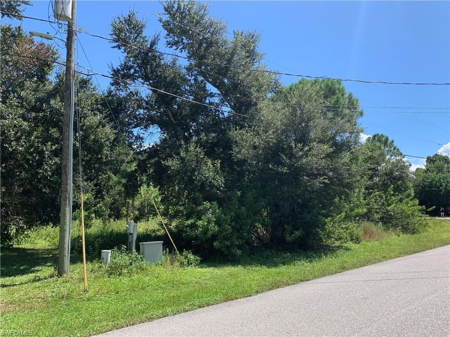 Spacious lot on paved road near Grassy Lake - electric at road - Neighboring lot 701 Fairfield Ave. (C-22-37-30-190-2410-0110) is also available for sale. (would make total lot size of .61 acres)