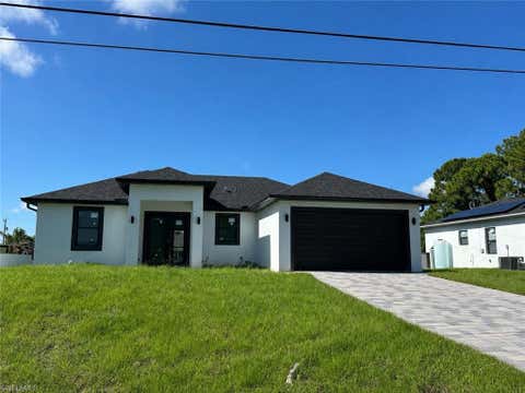 Photo of 3409 13th ST SW, LEHIGH ACRES, FL 33976 (MLS # 226028357)