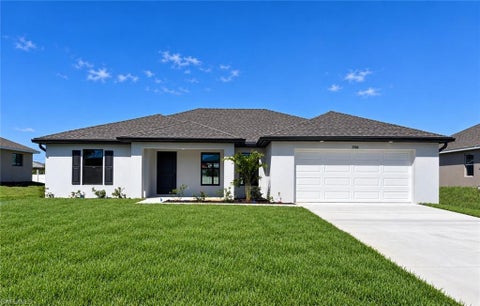Photo of 2506 26th ST SW, LEHIGH ACRES, FL 33976 (MLS # 226037870)