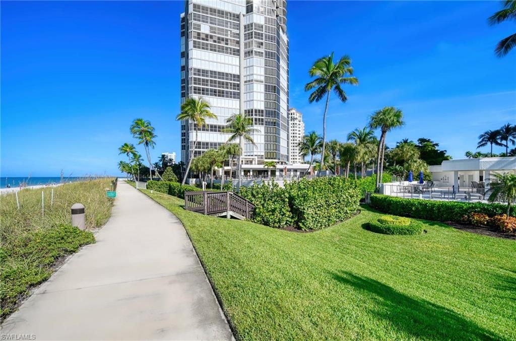 Photo of 4951 Gulf Shore BLVD N #104, NAPLES, FL 34103 (MLS # 225068943)