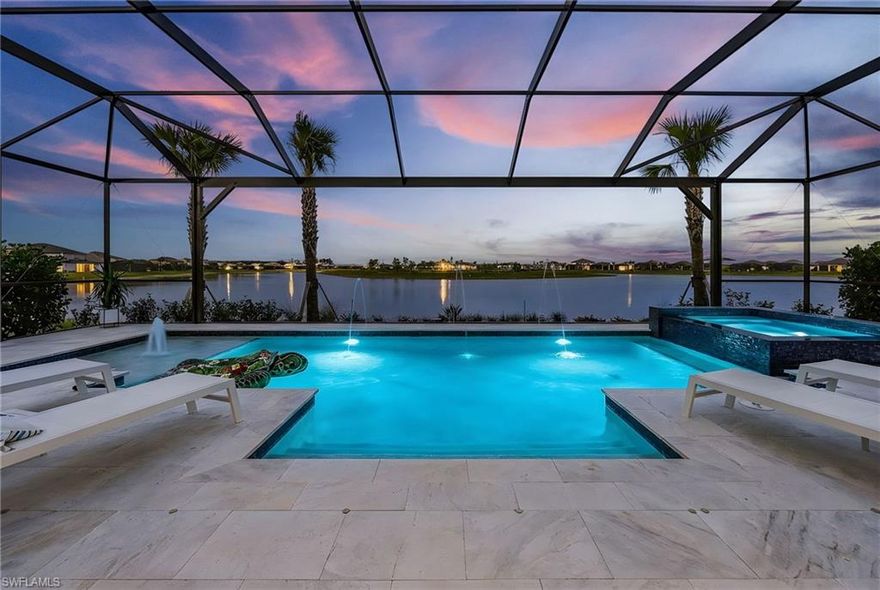 CHECKOUT THIS JAW DROPPING, FULLY UPGRADED RENOWN model on ONE OF THE MOST BREATHTAKING LAKEVIEWS in Verdana Village. MUST SEE! 3 BEDROOM + DEN AND 5 BATHS! 2850 SQUARE FEET. PANORAMIC LAKEVIEW! NO NEIGHBORS BEHIND! DREAM KITCHEN WITH HIGHEST LEVEL 6 UPGRADES, CALCATTA QUARTS COUNTERTOP, GLASS UPPERS, built in stainless steel appliances including a 48" FRIDGE, WINE COOLER, GAS COOKTOP, MICROWAVE/OVEN COMBO, HUGE ISLAND AND WALK IN PANTRY, TONS OF STORAGE. TWO-TONES CABINETARY, MARBLE BACKSPLASH & DESIGNER LIGHT FIXTURES.PANORAMIC LAKE VIEW!FULLY EXTENDED POOL DECK & POOL BATH.  SOLID ENGINEERED HARDWOOD FLOORS THROUGHOUT. CUSTOM CLOSET ORGANIZERS in all closets including WALK IN PANTRY.3 CAR GARAGE WITH 4' EXTENSION & EPOXY FLOORING, STUCCO GARAGE WALLS, WHOLE HOUSE WATER FILTERATION, pre-wired FAMILY ROOM SPEAKERS, WIFI EXTENDERS AND OUTDOOR SECURITY CAMERAS.ELEGANTLY FINISHED by an AWARD WINNING INTERIOR DESIGNER with no expenses spared. NO NEIGHBOURS BEHIND!   PRIMARY BEDROOM WITH MASSIVE WALKIN CLOSET and overlooks the breathtaking lake & pool. WOOD BEAM CEILINGS, CROWN MOULDING throughout, DESIGNER LIGHT FIXTURES, FAUCETS, VANITY MIRRORS, ACCENT WALLS IN ALL BEDROOMS, UPGRADED SHOWER TILES, quartz counters, custom drapery, ceiling fans. The ZERO CORNER SLIDERS lead you to the truly exceptional outdoor paradise with a MASSIVE CUSTOM HEATED, SALTWATER POOL WITH SPILLOVER SPA, sun deck with bubbler for the little ones or your furry friends, fountains, pool bath & panoramic view pool enclosure with CLUSIA PRIVACY TREES. A FULLY EXTENDED POOL DECK WITH LARGE, WHITE TRAVERTINE STONES & roughed in for OUTDOOR KITCHEN. Family room equipped with a CUSTOM ENTERTAINMENT UNIT, designer tile, BUILT IN FIREPLACE, SAMSUNG SUBWOOFER AND SOUNDBAR with deep bass perfect for movie nights or watching sporting events.  With a sought after floorplan, this home offers an OVERSIZED LAUNDRY ROOM and a separate powder room that guests can use without having to enter any bedrooms.  Verdana Village is one of the most sought after upscale communities. Indoor basketball, indoor/outdoor pickleball, tennis & ice cream parlor. Multiple breathtaking pools, hot tub, bars and restaurants with excellent culinary selections. Ride your golf cart to Publix, Liquor Store, UPS, Nail Salon, Award Winning Hair Salon, Dunkin Donuts, Physio, Italian Restaurant & more commercial amenities planned in the near future. A beautiful home with all the bells & whistles, sitting on a premium lot with stunning lake views in an upscale community fit for the most discerning buyer in an area that will only continue to grow. Welcome Home.