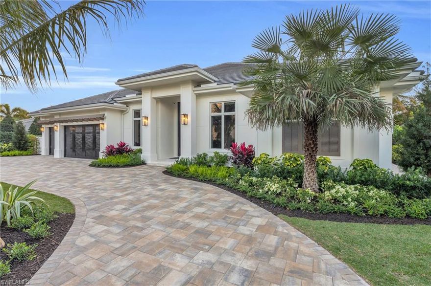 New construction in The Moorings of Naples, Florida, built by Borelli Construction—one of Naples’ longest-running family-owned luxury builders. This thoughtfully designed residence features architecture by JMDG Architecture and refined interiors and furnishings by Studio Sea Bee, showcasing top-quality materials and craftsmanship throughout. Offering 3,972 square feet under air, the home includes four spacious bedroom suites, each with a private bath, plus a dedicated study with closet. Additional highlights include a powder bath and separate pool bath. The expansive great room is ideal for both everyday living and entertaining, complete with a wet bar. The chef’s kitchen is appointed with European-style solid wood cabinetry, a striking stone range hood over the Wolf gas rangetop, Sub-Zero and Wolf appliances, and a butler’s pantry providing abundant additional storage. The primary suite is a serene retreat with a sitting area and a spa-like bath. Three custom closets with built-in cabinetry offer exceptional storage. European white oak flooring runs throughout the home, enhancing the clean, sophisticated aesthetic. Ten-foot sliding glass doors open to an oversized covered lanai with gas fireplace and a fully equipped outdoor kitchen, protected by electric screens and storm shutters—perfect for year-round indoor/outdoor living. The property boasts an unusually large yard for The Moorings, a rare and highly desirable feature. Additional upgrades include a whole-house generator with a 1,000-gallon propane tank, built-in Sonos ceiling speakers in the main living areas, primary suite, and outdoor spaces, and exterior security cameras. Ideally located close to the beach yet situated in an X500 flood zone, this home offers peace of mind along with a very convenient central Naples location and close proximity to downtown.