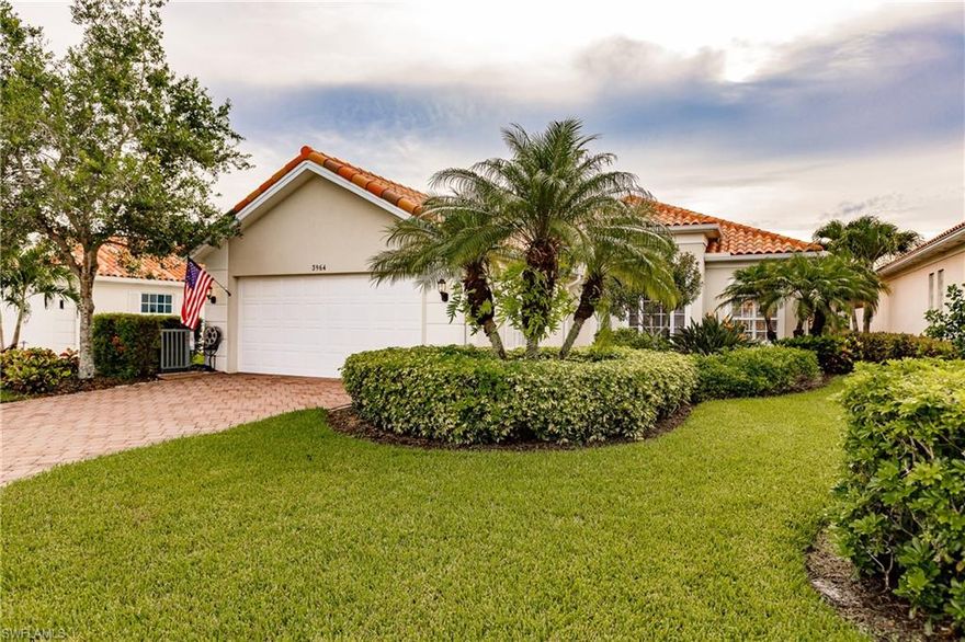 Are you looking for value and a superior location - this home delivers both!  This 3 bedroom plus den and 2 bath pool home is on the quietest street in Village Walk!  The pool and patio faces East and this home is light and bright.  The moment you step into this beautiful home you will know it was well maintained and lovingly cared for.   Many nice updates throughout, including:  new roof in 2018, plantation shutters on windows, granite kitchen counter tops with under cabinet lighting, stainless steel appliances with convection oven and warming tray, cabinets with pull out drawers, electric hurricane shutters over all sliding glass doors, bathrooms have granite tops and new comfort height toilets, brick paver driveway and walk ways, wall unit was modified for large screen tv's, and much more!  Less than 5 miles to the fine white sands of Vanderbilt Beach and 2 miles to grocery and dining.  The furniture is available too - come see it today!