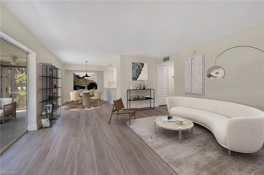 One or more photo(s) has been virtually staged, AI generated or rendered.  One (or more) photo(s) has been virtually staged, AI generated or rendered.  Beautifully renovated and move-in ready, this first-floor residence in Royal Bay Villas offers the perfect blend of modern style and relaxed Naples living. Thoughtfully updated throughout, the home features a sleek contemporary design highlighted by quartz countertops, crisp white shaker cabinetry, stainless steel appliances, and durable vinyl plank flooring that flows seamlessly from room to room.

The spacious layout includes two bedrooms and two beautifully updated bathrooms, with the primary suite showcasing a modern bath and a frameless glass shower enclosure for a clean, upscale feel. A convenient breakfast bar enhances the kitchen’s functionality, making it ideal for both casual dining and entertaining.

Expansive double sliding glass doors open to a versatile glass-enclosed lanai, creating additional living space that can easily transition to open-air enjoyment with screened windows—perfect for embracing Southwest Florida’s indoor-outdoor lifestyle. From here, take in tranquil, lush park-like views that provide a peaceful and private setting.

Ideally located just minutes from Fifth Avenue South and Third Street South, residents enjoy effortless access to world-class dining, boutique shopping, vibrant entertainment, and the pristine white sand beaches that define Naples living.