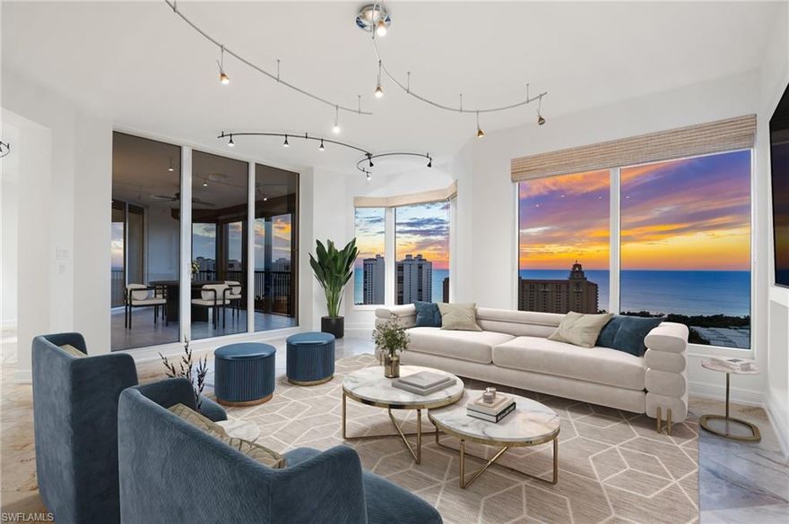 Perched atop the prestigious Trieste at Bay Colony, this extraordinary penthouse-level residence offers an unparalleled combination of comfort, space, and panoramic views. Encompassing over 6,800 square feet of living area, the home features four screened balconies, seven versatile bedroom spaces, a studio, and a library—providing endless opportunities to reimagine the layout or create a multigenerational family retreat. Step from your private elevator into a radiant great room where natural light and Gulf breezes set a tranquil tone. Open the sliders to enjoy the refreshing cross-breeze and seamless indoor-outdoor living. The expansive open kitchen overlooks the Gulf, creating the perfect setting for gathering with family and friends. Trieste offers world-class amenities including a resort-style pool, elegantly updated lobby areas, a state-of-the-art fitness center and a private movie theatre. As part of the exclusive Bay Colony & Pelican Bay community, residents also enjoy access to a private beach club, premier tennis facilities, brand new pickle ball facility and more. Completing this exceptional offering are four parking spaces and two storage units, ensuring the utmost convenience for your dream Naples lifestyle. *Photos have been virtually staged*
