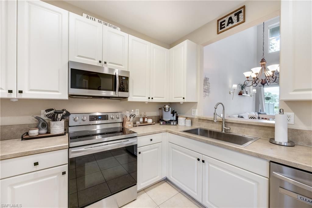 Photo of 1320 Mariposa CIR #104, NAPLES, FL 34105 (MLS # 225078375)