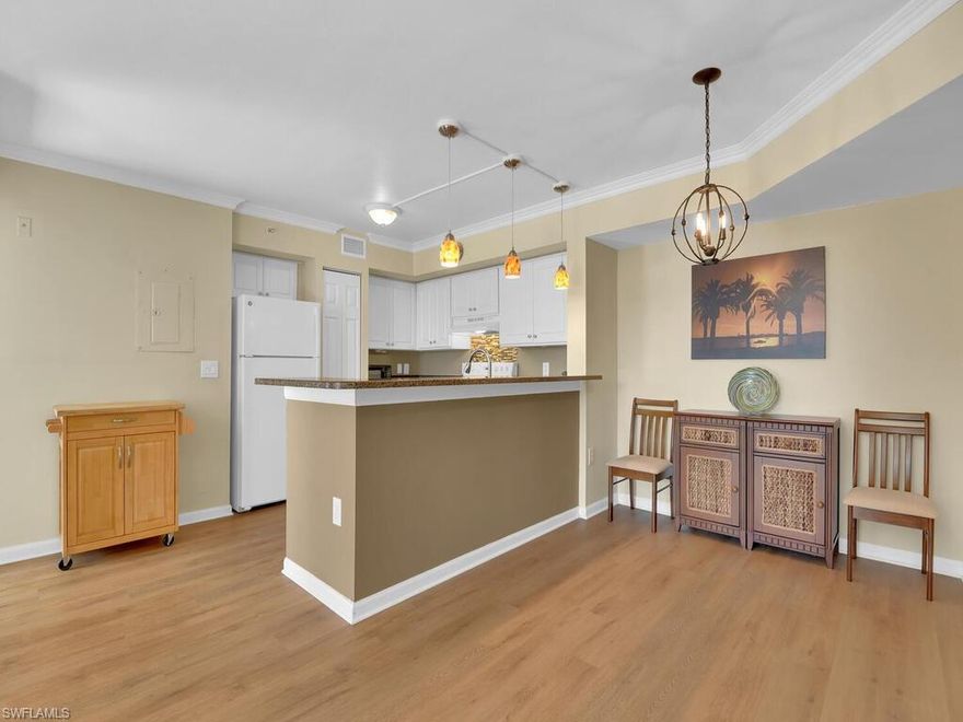 The Enclave at Naples, looking for a great location close to downtown Naples and easy access to I75? This is the perfect condo.  Nicely updated, no popcorn ceilings in this unit, crown molding and luxury vinyl plank flooring in the living area, and granite countertops. This 2 bedroom 2 bathroom condo has a spacious open plan and split bedrooms. Enjoying direct access on the first floor and a peaceful SW facing lanai overlooking a landscaped area. The Enclave offers many recreation options including tennis, racquetball, pool and fitness center.  This condo is move in ready.