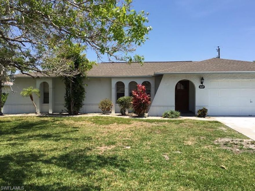 Looking for a great SW Cape home at a nice price? First time home buyers, why rent? Investment property or 2nd home to spend winters in the sun?  Come and take a look at this one!   This 2 or 3 bedroom plus 2 bath home is ready for your decorating touches.  The vaulted ceilings in the Living room & the kitchen gives a spacious feel. There's a flex room located off the dining area with a closet that can be used as a bedroom, an office or family room.  Plenty of closets in this home, including a large master walk-in.  Enjoy the spacious back yard with plenty of room for a pool.  The two stall garage with laundry area has additional cabinets for storage.  Plus all assessments are in and paid!  Located near Skyline & Cape Coral Parkway with easy access to restaurants & shopping.