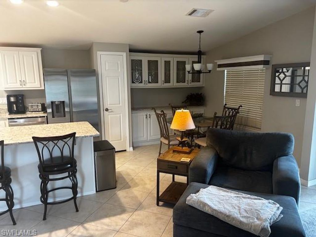 Photo of 1234 Silver Lakes BLVD, NAPLES, FL 34114 (MLS # 226011260)