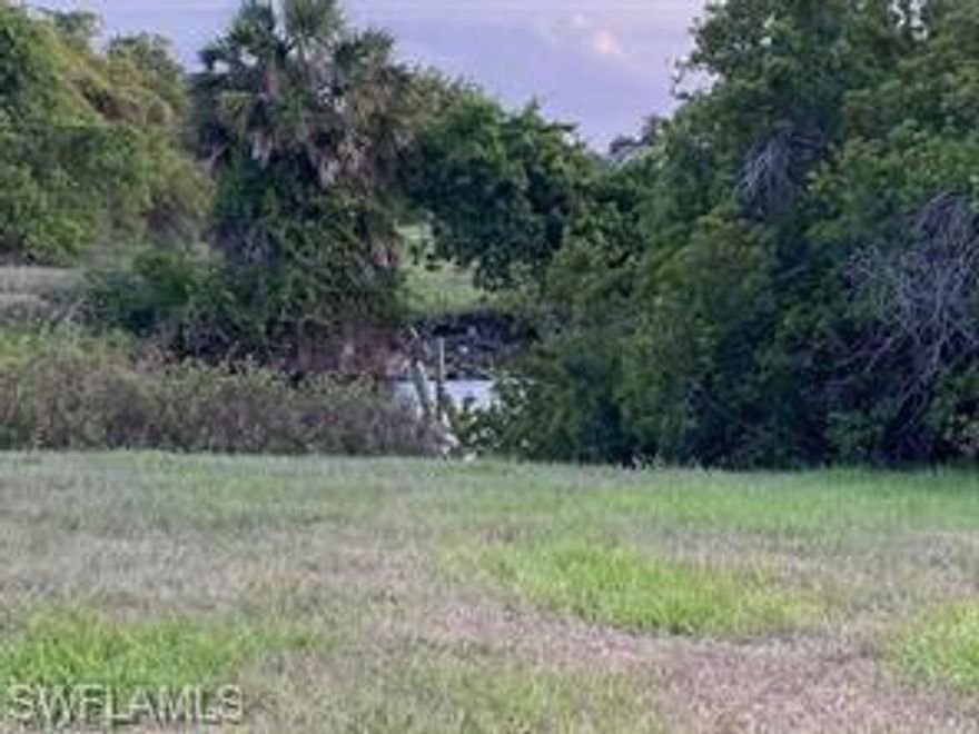 Build your dream home on this desirable cul-de-sac homesite in the Deep Creek community of Punta Gorda! Located in a quiet, established neighborhood with very low HOA fees, this property offers a blend of privacy, convenience, and Florida living. Deep Creek is a deed-restricted community known for its beautifully maintained surroundings, public water and sewer, and peaceful setting. Residents enjoy access to Deep Creek Golf Club, nearby parks, playgrounds, tennis courts, and miles of walkable streets. The community also provides quick access to I-75, making travel to Fort Myers, Sarasota, and local beaches a breeze. Just a short drive to downtown Punta Gorda, waterfront dining, shopping, medical facilities, and the beautiful Peace River. Don’t miss your chance to secure land in one of the area’s most sought-after communities. Start planning your Florida dream home today!