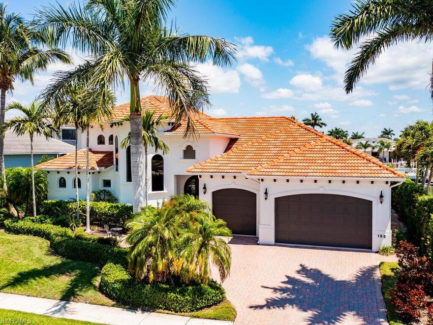 This is the one you've been waiting for!  This spacious direct water residence embodies the essence of luxury and relaxation on Marco Island.  Nestled in a private neighborhood with quick direct water access out to the Gulf of Mexico, this home boasts a 3 car garage, 4 bedrooms, 3.5 baths and an open floorplan that seamlessly blends indoor and outdoor living spaces. High ceilings and ample natural light create an airy and inviting atmosphere throughout the home.  Featuring a desirable first floor primary bedroom, the residence also boasts an open kitchen and a large lanai with pool and spa, terrific for entertaining.  A large private dock with a 25,000 lb lift extends into the water, providing direct access for boating, fishing, and other water activities. In addition to impact windows, recent updates include a new roof (2020), exterior painting (2021), new picture frame lanai cage (2023), pool resurfacing (2023), new 2 Trane HVAC (2022), new balcony tile (2023), plantation shutters (2023), impact br door (2023), and 2 new reclining couches (2023).  Lush tropical landscaping with pavers frame the home, creating a verdant oasis that blends harmoniously with the natural surroundings.  Come check it out today!
***Motivated Seller***