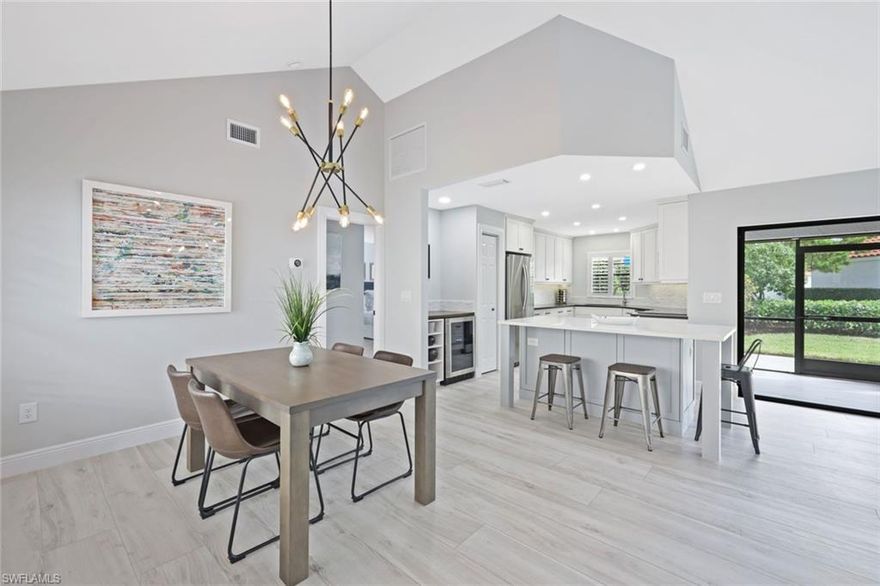 4 Month Minimum. Nestled less than a mile from the pristine Vanderbilt Beach, this exquisitely renovated TURNKEY FURNISHED two-bedroom, two-bathroom villa with a two-car garage offers a luxurious retreat. Soaring high ceilings, an abundance of natural light, and elegant porcelain tile flooring create an inviting ambiance, complemented by a serene private courtyard and newly redesigned master and guest bathrooms. The stunning modern kitchen boasts brand-new stainless steel appliances, a spacious island with a bar area, and a wine refrigerator—perfect for entertaining or unwinding. The screened lanai flows effortlessly into an outdoor patio featuring a grill and lush backyard, ideal for evening relaxation. A short stroll or bike ride away, enjoy breathtaking nightly sunsets at Vanderbilt Beach! Beachwalk, a prestigious 24/7 gated community, enhances the experience with manicured landscaping, tennis courts, bocce ball, a community pool, spa, and clubhouse. Ideally positioned west of US 41, Beachwalk is mere minutes from the upscale Mercato shopping and dining district, Publix, CVS, theaters, a walk-in clinic, and the Ritz-Carlton Golf Resort & Spa. Extensive walking/biking paths further enhance its family-friendly appeal, making it a lock-and-leave paradise for snowbirds, retirees, and year-round residents seeking the quintessential Southwest Florida escape.