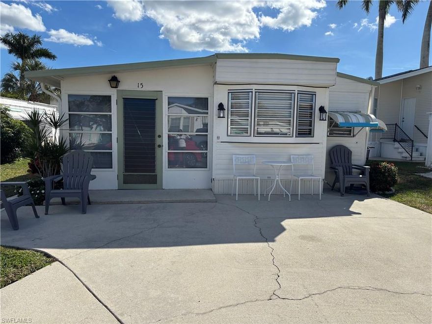 ADDORABLE AND AFFORDABLE WINTER GET AWAY IN THE FINEST PARK OF ITS KIND IN SWFL, ENCHANTING SHORES 55+ CO-OP. THIS 1 BEDROOM, ONE BATHROOM WELL MAINTAINED AND BEAUTIFULLY RENOVATED PARK MODEL FEATURES PORCELAIN TILE LANAI COMPLETELY FURNISHED. THE LANAI LEADS TO AN ATTACHED LAUNDRY ROOM/SHED. THE UPPER LEVEL HAS A COMFORTABLE SITTING AREA WITH LUXURY VINYL PLANK FLOORING, NEWLY FACED CABINETS, NEW COUNTERTOPS, PLENTY OF CUPBOARDS SPACE AS WELL AS NEWER APPLIANCES. THE COMFORTABLE BEDROOM OFFERS A QUEEN SIZE BED, LOTS OF STORAGE AND IS NEXT TO THE LOVELY REMODELED BATHROOM. THIS PARK MODEL HOME ALSO INCLUDES PAVED PARKING FOR TWO VEHICLES. ONLY MINUTES FROM POPULAR MARCO ISLAND AND A SHORT DRIVE TO DOWNTOWN NAPLES ENCHANTING SHORES IS ACCESSIBLE TO MANY EATERIES, SHOPS AND SERVICES. THERE ARE MULTITUDES OF ACTIVITIES, EVENTS AND CLUBS SHOULD THE SHAREHOLDER WISH TO PARTICIPATE. ACCESS TO THE GULF OF AMERICA IS AVAILABLE RIGHT FROM ESC'S OWN PRIVATE BOAT LAUNCH AND THE PARK OFFERS BOAT PARKING AS WELL.  HERE IS AN OPPORTUNITY TO GET AWAY FROM THE FRIGID WEATHER AND BASK IN THE SUN IN WONDERFUL SOUTHSTEW FLORIDA.