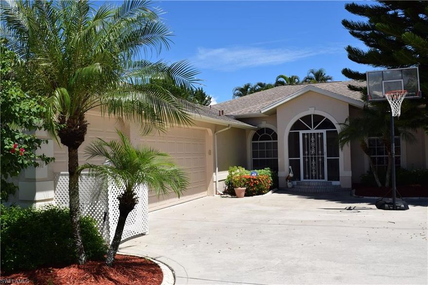 Rarely available floor plan in the prime neighborhood of Caloosa Trace w/a brand new roof in the works!! Large, extremely well maintained ranch with four bedroom plus TWO dens & three garage spaces!! Enjoy entertaining friends and family in this open, split bedroom home. Master Retreat includes separate wing, three sinks plus vanity, spa tub, walk-in shower, huge closets and lanai access!! Plenty of space for children or guests with two spare bathrooms, more double sinks and three more bedrooms. Enjoy year round BBQs under your screened outdoor living space with lush private landscape. Perfect for a growing family, multi-generations, or FGCU students. It's a must-see so schedule your appointment today!