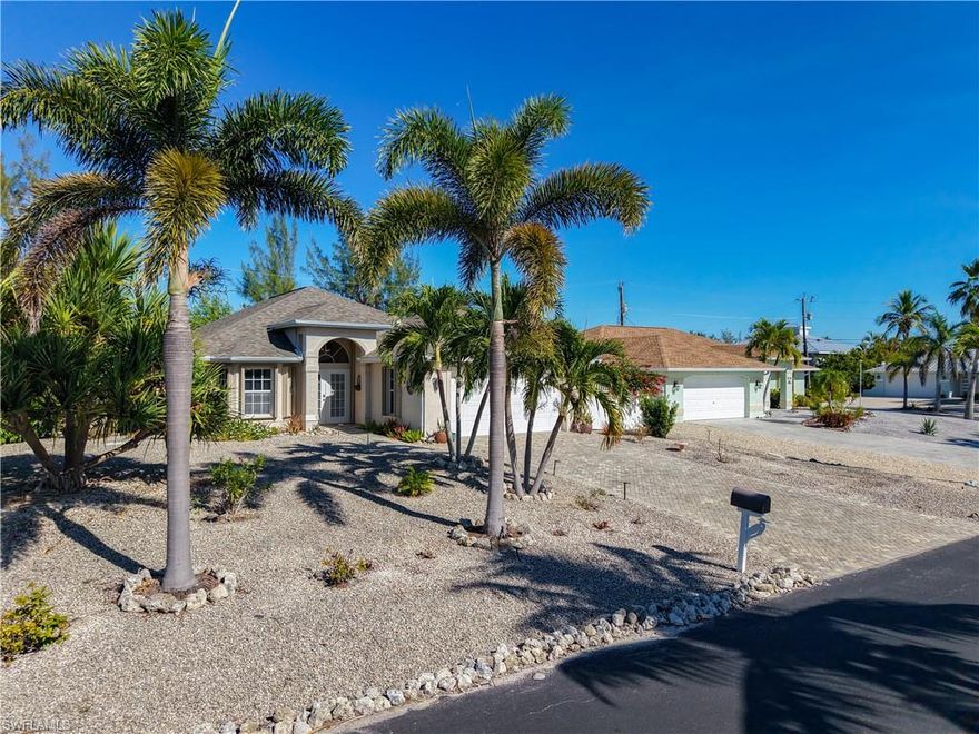 Gulf-access boating lifestyle—without the waterfront price or insurance costs! Located in a sought-after St. James City boating community, this bright and breezy 3 bedroom, 2 bath home offers the island vibe buyers love while staying high and dry.

Inside, enjoy a desirable split-bedroom floor plan, a spacious great room, and easy indoor-outdoor living with a screened lanai overlooking mature tropical landscaping—perfect for morning coffee, island breezes, and relaxed evenings.

Set directly across from canalfront homes, this property delivers location and lifestyle without the added expense of living on the water. For just $150/year, buyers may voluntarily join the HOA and enjoy access to the private community boat ramp—launch your boat and reach the Gulf in approximately 5 minutes. Ideal for boating, fishing, and sunset cruising.

Bonus opportunity: The adjacent vacant lot is owned by the sellers. While not currently on the market, buyers may inquire if interested in additional space or future flexibility.

If you’ve been searching for an affordable way to enjoy Pine Island living, boating access, and island charm, this home checks all the boxes.