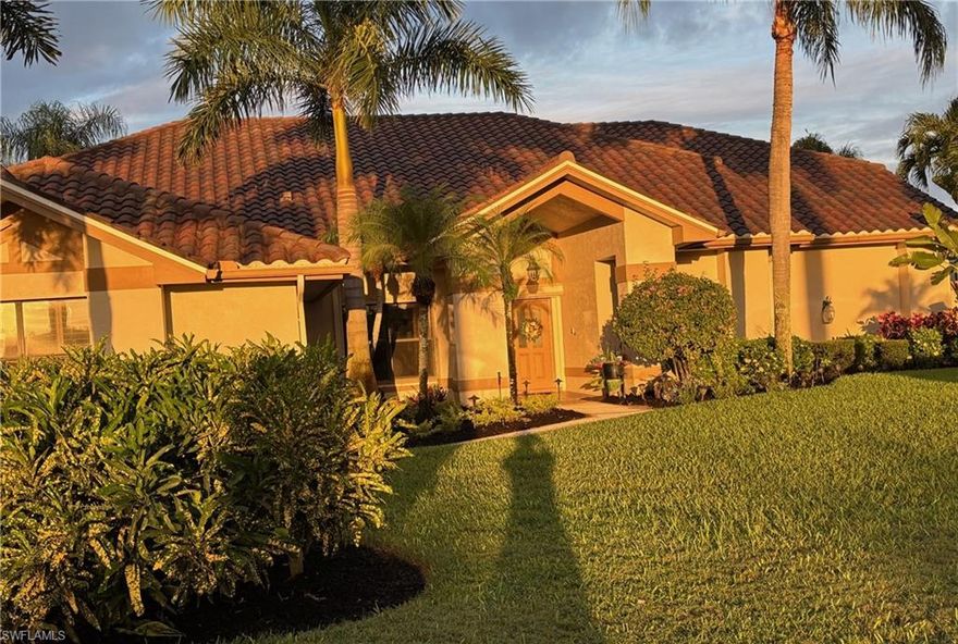 Wait until you see the view from this lovely home, it's spectacular.   Of the 2nd hole tee boxes and fairway of the Arnold Palmer designed signature golf course and a lake that separates you from the tee boxes; no golf balls in your yard!  Sip your beverage of choice on the very large lanai under cover or relax in the pool/spa to see the golfers and the wildlife.  The rooms are a very nice size and there are 3 full baths, one being a pool/guest bath.  This home is perfect for entertaining with a slider from the great room to the large lanai and outdoor kitchen area.  The community, with only 450 doors, is active enough to make many friends and to be as busy as you'd like.  Wildcat Run boasts the golf course, a state-of-the-art fitness center, tennis, pickleball, bocce, mah-jongg and cards, two restaurants and a snack bar.   You won't want to miss this home.  PROFESSIONAL PICTURES TO FOLLOW.