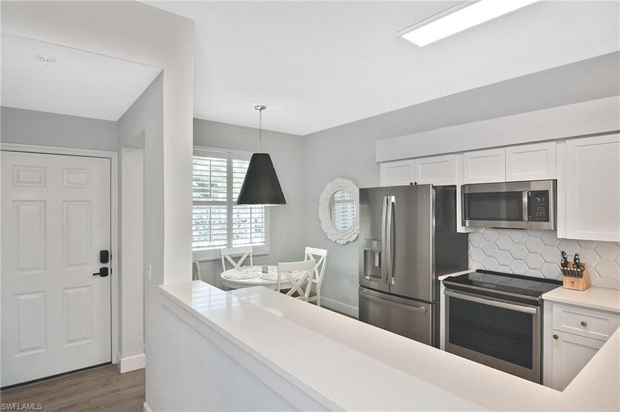 Completely remodeled condo offered turnkey—including all newer large HD TVs. From the moment you enter, you’ll notice the bright, open feel created by two kitchen half walls that enhance the lake and fountain views. A shiplap wall extends from the dining area into the family room, adding inviting coastal character. The redesigned kitchen is a standout, featuring new cabinetry with large drawers, white quartz countertops, and stainless-steel appliances, all opening beautifully to the main living area. Cortex cork flooring runs throughout the main living spaces, complemented by modern light fixtures.
The bathrooms have been fully renovated, offering premium step-in tile showers with built-in benches, custom vanities, and frameless glass doors, creating a spa-like experience that blends style and function. The private lanai overlooks the 18th hole, with peaceful lake and golf course views—an ideal spot to enjoy morning coffee or unwind at the end of the day. The building’s prime location is close to the clubhouse, fitness center, and main pool.
This active, amenity-rich community offers 36 holes of championship golf, tennis, pickleball, bocce ball, and a full calendar of social activities and events at Heritage Palms Golf & Country Club. The building features a new roof and elevator, and the well-managed HOA has recently reduced dues—offering long-term value and peace of mind. Schedule your showing today—words and pictures truly can’t capture the beautiful details of this home.