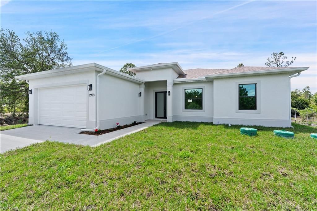 Photo of 2903 37th ST W, LEHIGH ACRES, FL 33971 (MLS # 226005140)
