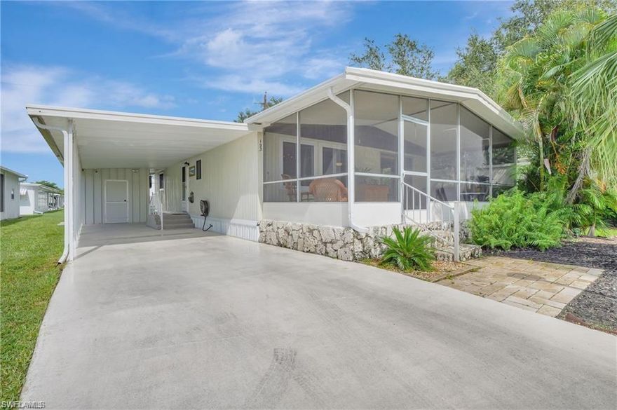 PACK YOUR BAGS—PARADISE AWAITS! Welcome to this beautifully updated and meticulously maintained 2-bedroom plus den, 2-bath residence in the highly desired Holiday Manor Community- perfectly designed for easy Florida living. FRESHLY PAINTED and move-in ready, this open-concept home shines with newer PVC 100% waterproof luxury vinyl plank flooring and ceiling fans throughout, offering both style and comfort. Step outside to the spacious screened lanai, an ideal spot for entertaining guests or unwinding with your favorite beverage while enjoying serene tropical views on a quiet DEAD-END STREET. Enjoy added privacy with neighbors on only one side. Recent upgrades provide peace of mind, including a newer HVAC system, newer double-pane windows, and window treatments on every window. The home comes fully equipped with an upgraded washer & dryer and stainless steel appliances. The oversized STORAGE SHED gives you plenty of room for all your belongings. Boaters, take note! This desirable Gulf-access community offers a PRIVATE BOAT RAMP, storage or DOCK SPACE for your boat, and the large COVERED CARPORT easily accommodates your car along with a boat or jet skis—a rare find at this price point. Located just minutes from the world-class beaches of Naples and Marco Island, as well as downtown Naples, shopping, dining, and entertainment, this home offers the ultimate Southwest Florida lifestyle. Holiday Manor is a warm and welcoming 55+ community featuring a clubhouse, community pool & spa, and shuffleboard, perfect for full-time living or a seasonal winter escape. Please note: pets are not permitted, and buyers must have a 700+ credit score. Don’t miss this opportunity to own your slice of Gulf-access paradise. Schedule your private showing today!