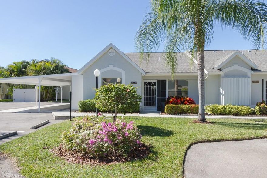 Terrific End Unit, Villa in wonderful N. Naples neighbourhood. This home offers a great screened entryway, vaulted ceilings, lush landscaped view and steps to the community pool.  The villa has 2 bedrooms, 2 baths, an eat-in kitchen area, and spacious Living Room with room for a Dining area also.  Step out onto the lanai and enjoy the cool breezes, Western exposure and relaxing atmosphere of Florida living.  There is a carport and extra storage room with the home and you are located close to local shops, the beaches, restaurants and only about 20 minutes to RSW airport.