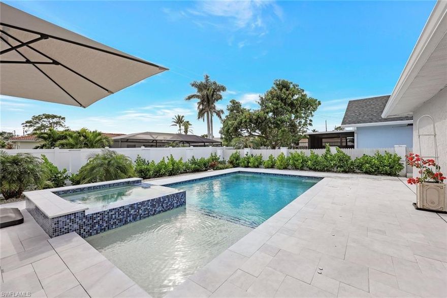 RENOVATED • NO HOA • NO RENTAL RESTRICTIONS

Beautifully renovated southern-exposure Naples Park home offering nearly 2,000 sq ft—one of the largest non–new construction homes in the area. Completely remodeled down to the studs, featuring brand-new impact windows throughout, luxury vinyl plank flooring, modern fixtures, updated baths, and a chef-style kitchen with quartz countertops, shaker cabinets, stainless appliances, and a large island.

Vaulted ceilings and oversized closets create an open, airy feel, with flexibility to add a 4th bedroom. Step outside to a private heated saltwater pool and spa (2023) surrounded by elegant marble pavers—ideal for entertaining or relaxing.

Additional upgrades include a 2022 roof, new plumbing, keyless entry, and a 1-car garage. No HOA, no rental restrictions, and no flooding history—even during major hurricanes.

Located on the desirable 700 block, minutes to Vanderbilt Beach, Wiggins Pass, Mercato, Whole Foods, and top Naples attractions.

Move-in ready, high-demand location, and exceptional flexibility—priced to attract immediate interest.