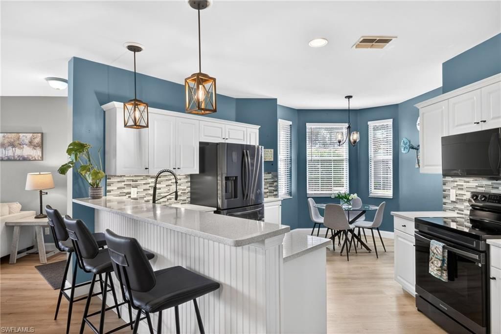 Photo of 6295 Wilshire Pines CIR #604, NAPLES, FL 34109 (MLS # 226017314)