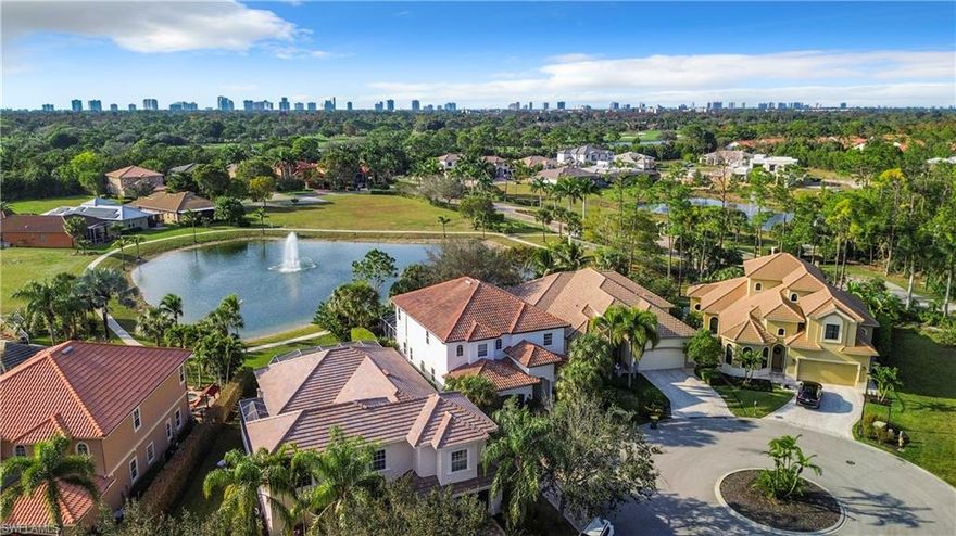 Naples best kept secret !In the center of town completely private on quiet cul de sac this home welcomes you ,your family and it is pet friendly!Perfect for entertaining this furnished home featuring private pool and jacuzzi overlooking the lake. Short drive to the beach and 5th Avenue, and just a few minutes from Waterside shops and Mercato.Grocery stores shops restaurants and banks are just few minutes away.Each of 4 extra large bedrooms are all equipped with en suite walk-in closets and full bathrooms, in addition to a full pool bath. The 20'+ ceilings in the living area open up to a loft/flex space on the second level that can be used as den, the first floor bedroom . Private balcony off the master bedroom offers relaxing lake view and heated pool and spa.