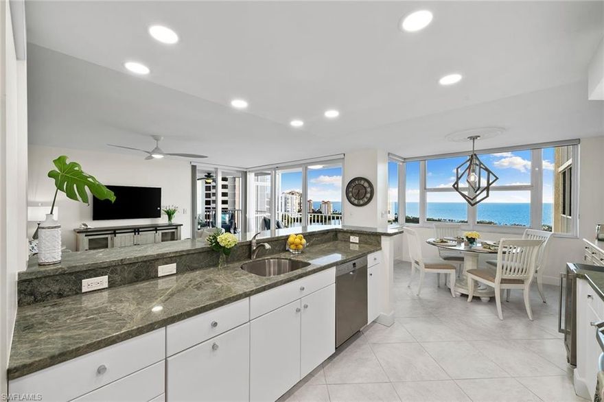 Exceptional price, extraordinary opportunity! This 17th-floor stunner captures private sunsets and one of Naples’ most exceptional vistas, ideally near Clam Pass with sweeping Gulf views and city lights after dark. A true price leader and rare high-rise opportunity. Enjoy a spacious wrap-around lanai and oversized terrace—perfect for sunset skies and coastal views. Offered turnkey.  The remastered kitchen features raised ceilings, updated lighting, an open layout. Upgrades include impact-resistant windows/sliders, Hunter Douglas window treatments, Bosch washer/dryer, dishwasher, induction stove, kitchen cabinets, water heater, HVAC. Extra-large storage closet down the hall. Opportunity to lightly personalize. Located on the light-filled south side, offering exceptional light and privacy. Well-managed building with on-site manager, attentive front desk, two guest suites, UPDATED & sunny lap pool/spa, BBQ grills, community room with kitchen, card room, and fitness. St. Nicole is completing designer renovations to the lobby, pool, fitness, and social spaces—enhancing long-term VALUE. Private tram to Pelican Bay beaches with chair service, dining, tennis, pickleball, sailing, kayaking, and scenic trails. Walk to Artis–Naples & Waterside Shops; minutes to Olde Naples & Mercato. RSW ~25 min. Two pets (15 lbs). 30-day rentals, 3/year.