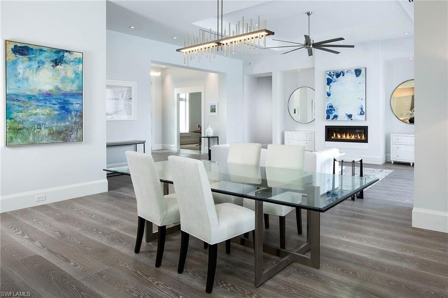 New construction, this superbly crafted, waterfront  property, with a coastal contemporary design, embodies the entertaining lifestyle of Port Royal. Encompassing over 6,800 square feet under air, the sought after open floor plan, transitions seamlessly to an expansive outdoor living space complete with both covered and uncovered seating areas, complimenting the pool and spa, summer kitchen and fire feature. The kitchen boasts double islands with beautiful, eco-friendly quartz countertops, Miele appliances and a fully equipped butler’s pantry. The generous first floor master retreat is resplendent with stunning views, a waterfront sitting area and sliding barn doors opening to a stunning master bath with walk-through shower, separate water closets, and soaking tub. A second floor master bedroom with sundeck will delight guests when used as a VIP suite. This exquisite home offers additional en-suite bedrooms, private elevator, second floor laundry, flex room, grey-washed wide plank oak floors throughout, Lutron lighting, prewired audio with concealed speakers, camera monitored security, impact glass, automated storm shutters and three-car garage.