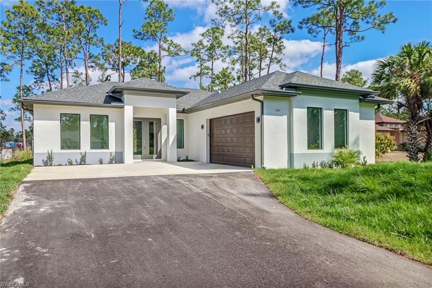 LOCATION LOCATION!! 10TH AVE NE! HOME IS DONE! MOVE IN READY on 1.14 ACRES! Neighbor to your right owns 2.73 acres providing privacy between the two homes. 10th AVE NE is minutes to new shopping centers on the corner of Everglades and Golden Gate Blvd. Big Corkscrew Island park and new communities recently added to the area and only 15 minutes from the new Founder Square Plaza. Fantastic full time residence or investment purchase. Split bedroom plan with 3 bedrooms plus a light bright DEN perfect for a home office or play room. The 1.14 acre lot is 75 feet wide and 662 feet deep, providing ample space for storage or a pool. Open living space with tray ceiling, crown moulding and recessed lighting. The kitchen features stainless steel appliances, 42" wood cabinets, quartz countertops and tile backsplash. Porcelain tile floors throughout the home. The master suite features dual walk-in closets, dual vanities and tempered glass shower. NO HOA, aerial photos ARE the actual property, interiors are of a similiar completed model. Bring your families, pets and outdoor toys!! No HOA and only 10 minutes away from shopping and dining!