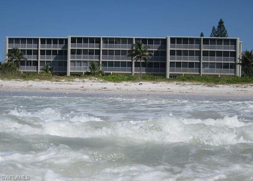 This is a beautifully renovated corner-end condominium that includes a rare valuable air conditioned beach-front Cabana.  This is one of the closest Sanibel condos to the beach! Unique to this condo are TWO wraparound glass & screen enclosed lanais, offering expansive space to take in Gulf views. The panoramic-direct Gulf views are an unbeatable beachfront experience. Just steps from the surf, enjoy breathtaking sunrises & sunsets to the soothing sound of ocean waves. Upgraded recently, this condo features all new windows and sliders, Italian plank porcelain tile, and Labradorite granite counters.  Everything is new (stainless appliances, full size washer/dryer, AC, water heater, wiring, pipes, and sound insulation between all walls & ceilings). The beachfront Cabana adds 450 sq ft of bonus space with a new bathroom, shower, air conditioner, and cable. It is the widest & best located Cabana with glass & screen sliding doors a few feet from the beach. Also included: a big secure storage closet (perfect for your bikes & beach/pool items) next to your covered parking spot. Pet friendly (Owners Only) no pet weight limits. Heated pool, tennis, pickleball, shuffleboard, and grills.  With a projected gross rental income of $150,000, this condo is a perfect investment, vacation, or fulltime home. Don’t miss this priced to sell fast piece of paradise!