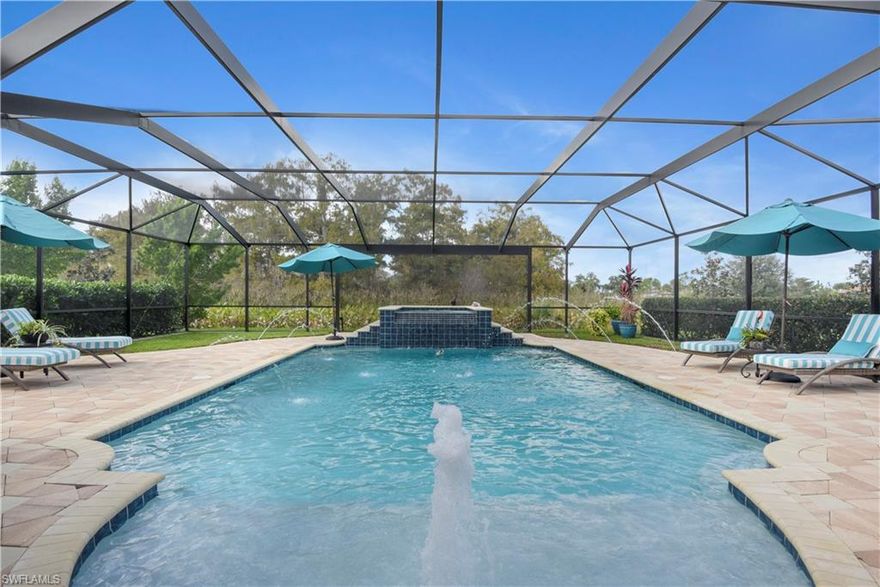 Luxury Country Club living at it's finest! This stunning home offers a great room design & a spacious outdoor living space featuring a custom designed heated pool & spa w/ remote system, summer kitchen w/ wine cooler, full size fridge, sink, & grill (Ideal outdoor space for the dog lovers-grass area within pool area). The disappearing sliders leading from the great room to the pool lanai, aquarium window in formal dining area, volume ceilings accented w/ coffer detail & wide crown, French door entry w/ elegant design, custom trim, large tile flooring set on diagonal, and the open concept kitchen all create an incredible open & inviting feel to this home. A true gourmet kitchen, upgraded wood cabinets w/ pull outs, induction cooktop w/ pot filler, spice rack cabinets, walk-in pantry, wall microwave & convection oven, soft closing doors/drawers, and a wide island w/ sink. Each guest room has a private full bath, and the den offers a pocket door for extra privacy - all closets offer custom storage systems. Twin Eagles "where the pros play" is situated on 1,115 acres of unspoiled, natural tranquility offering 2 Championship Golf Courses & much more. Full Golf Membership Included!!