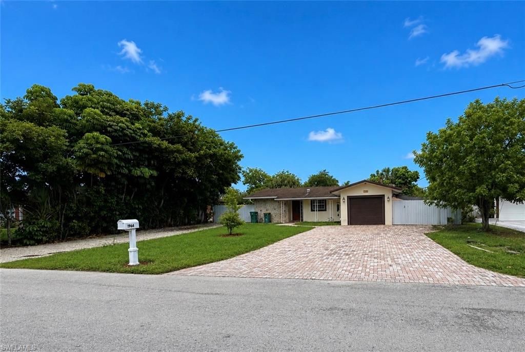 Photo of 1964 42nd ST SW, NAPLES, FL 34116 (MLS # 226021140)