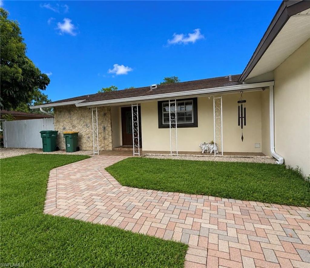 Photo of 1964 42nd ST SW, NAPLES, FL 34116 (MLS # 226021140)