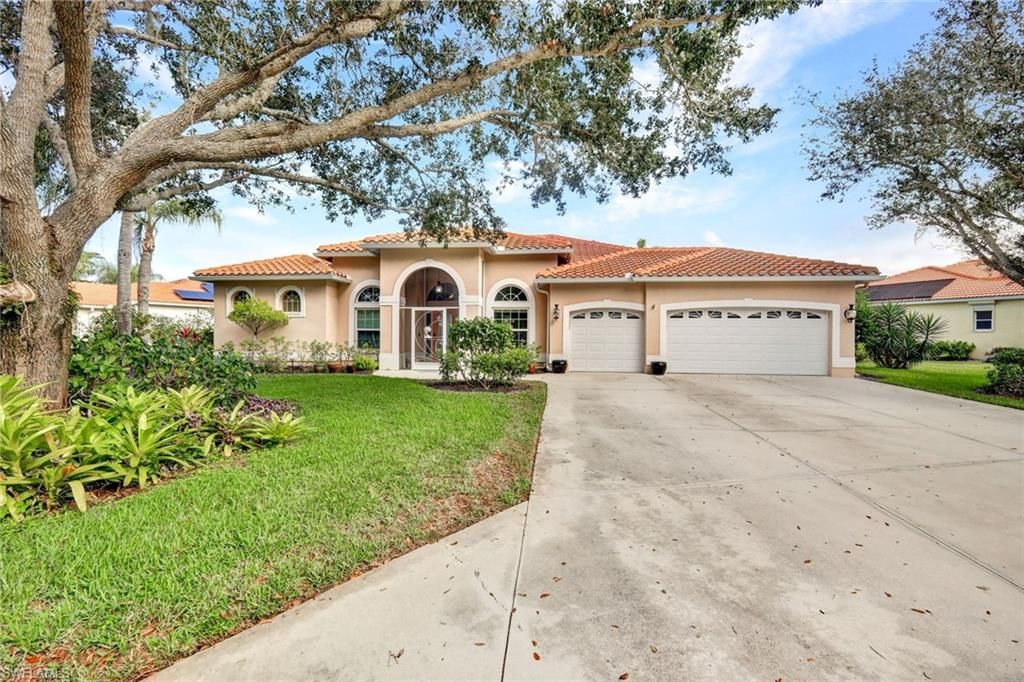 Photo of 9411 Cedar Creek DR, BONITA SPRINGS, FL 34135 (MLS # 225083376)