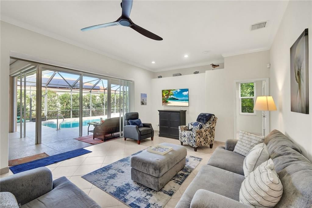 Photo of 9411 Cedar Creek DR, BONITA SPRINGS, FL 34135 (MLS # 225083376)