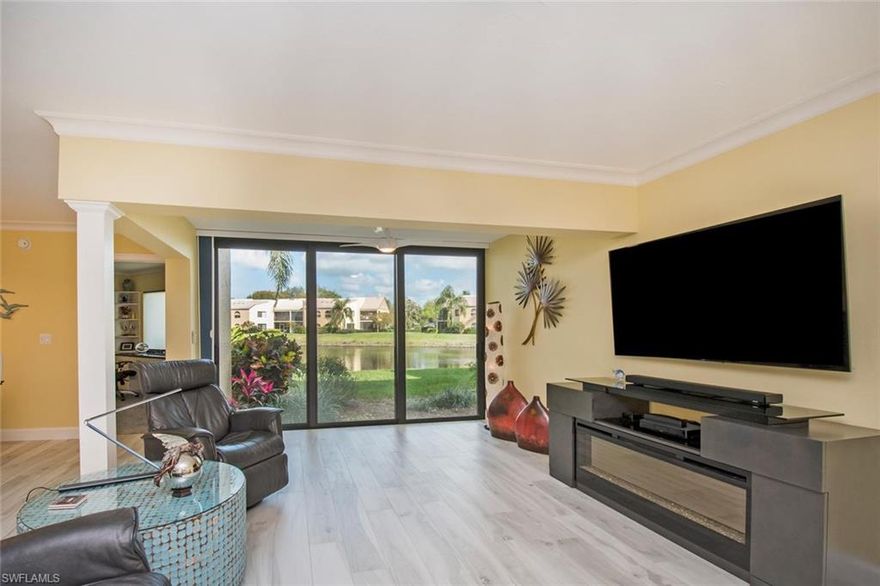 This is it! Completely Remodeled, First Floor, Open Floor Plan, Contemporary Garden Residence with a Killer Lake View & Water Feature. The Community Pool is just Steps from your front door & the Vanderbilt Beach Access Gate is a Short Stroll away. High-end Finishes throughout include Sleek Cambria Quartz Kitchen Counter Tops Accented with Unique Reflective Glass Backsplash, LED recessed & Under Cabinet Lighting, Stainless Appliances, Custom Cabinets and Wine Chiller. The Master Bath/Bedroom offer a SpaLike Ambiance w/Polymer Based Recycled Glass Countertops & Textured Glass Listello, Heated Towel Racks, Large Lighted Mirrors & Calming Colors. The Master Walk-In Closet features Motion Sensor Lighting and Custom Configuration.  The Washer/Dryer are cleverly housed in a Custom Built Cabinet with a Polymer Recycled Glass Countertop and Lighting.  All New Impact Doors, Windows, AC, Water Heater, Keyless Entry & So Much More making this Perfect for a Seasonal Retreat, Year Round Living or an Investment Purchase. This Gated, Amenity Rich Community features a Clubhouse,  2 pools, an Exercise Room, Bocce Court and 6 Har Tru Tennis Courts with an Active Tennis Program.
