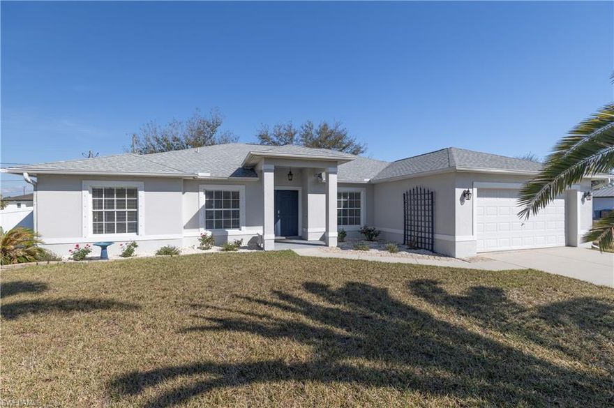 Welcome to your slice of paradise in beautiful Cape Coral! This stunning 4-bedroom, 3-bath home perfectly blends comfort, style, and Florida outdoor living.
Step inside to find tile flooring throughout the main living areas, complemented by warm wood floors in all bedrooms for a cozy, inviting feel. The spacious kitchen is a true centerpiece, featuring sleek stainless-steel appliances, crisp white cabinetry, and ample counter space ideal for entertaining or everyday living.
The master suite offers a generous layout with sliding glass doors that open directly to an oversized screened patio, creating a seamless indoor-outdoor retreat. The master bathroom includes dual sinks, a separate soaking tub, and a walk-in shower, providing both functionality and relaxation.
Outdoors, enjoy your own private oasis with a fully fenced backyard, mature landscaping, and a unique custom outdoor checkerboard game perfect for gatherings with family and friends. The oversized screened patio offers plenty of room for lounging, dining, or simply enjoying the Florida breeze year-round.
With thoughtful upgrades and inviting outdoor spaces, this home captures the best of Southwest Florida living. Don’t miss the opportunity to make it yours!