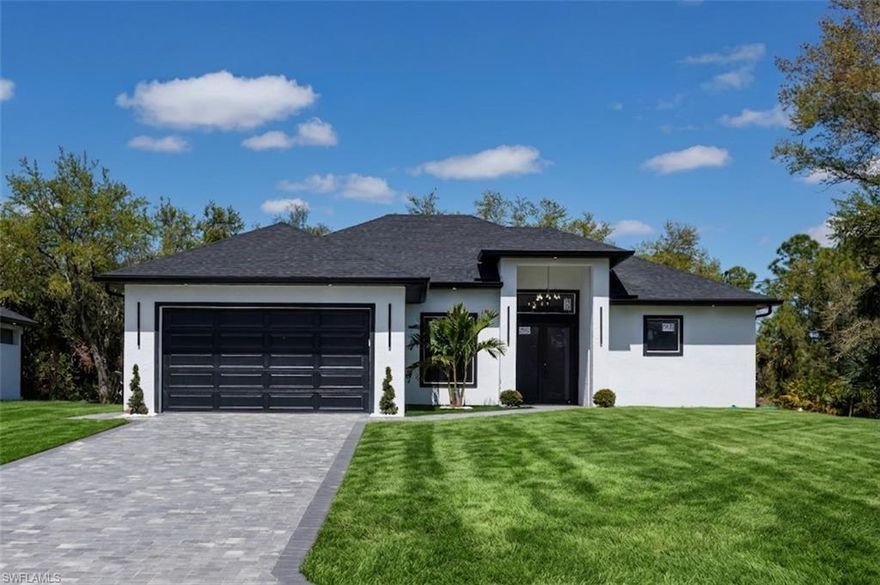 Welcome to this beautifully upgraded 3-bedroom, 2-bathroom home featuring a dedicated home office and a spacious 2-car garage. Designed for modern Florida living, this move-in-ready property is packed with high-end finishes, including luxury floor tiles that flow seamlessly throughout the open-concept living spaces. Glamorous custom "bling" statement lighting fixtures add a sophisticated touch, making every room shine. The gourmet kitchen is built to impress, complete with a generous pantry, refrigerator, and dishwasher. When it is time to entertain, step through the glass doors to your private backyard oasis featuring a outdoor kitchen, perfect for hosting or simply enjoying the beautiful Florida weather. For your absolute convenience, a washer and dryer are also included. This home is an absolute showstopper. Schedule your private tour today before it's gone!