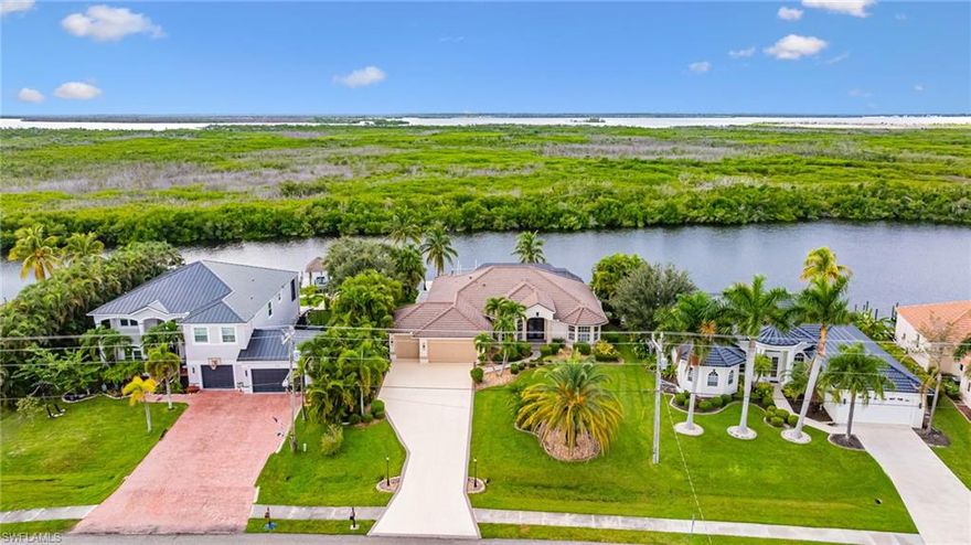 Experience the best of Southwest Florida living from this elegant direct, gulf access residence on Surfside Boulevard. Thoughtfully furnished and completely turnkey, this home blends comfort, style, and an effortless connection to the water.

An open great room with soaring ceilings and natural light sets the tone for relaxed sophistication. The kitchen, dining, and living spaces flow seamlessly toward the screened lanai, where a heated pool, spa, and private dock with boat lift await. From morning coffee overlooking the canal to sunset boat rides to the Gulf, every detail is designed for ease and enjoyment.

With four bedrooms plus a den, three full baths, and a spacious three-car garage, the home offers both functionality and flexibility for seasonal or annual living. The owner’s suite opens directly to the pool deck, while guest rooms are privately positioned for comfort and quiet.

Available turnkey for the 2026 season (January–April) or as an annual lease, this is a rare opportunity to enjoy direct Gulf access, refined interiors, and the coastal lifestyle that makes Cape Coral so desirable. Seasonal rate is $10,000 per month, and annual rate is $4,500 per month.