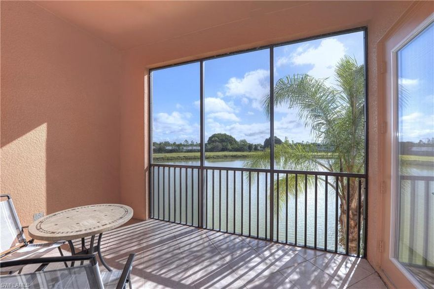 REDUCED!  LAKEFRONT condo with 1 car GARAGE in gated and desirable South Fort Myers location. This unit has been barely lived in as a vacation home by the original owner. This popular 2/2 Begonia model is on the 2nd floor (top floor) which means no noisy neighbors over head. Unit has many upgrades including large tile, granite, enormous walk in closets, New A/C OCT 2016 and a large open floor plan.  Enjoy the lake and fountain views from living room, master bedroom and screened porch. Home  is being sold turnkey and fully furnished. Palmetto Cove has a low condo fee of $350 per month which includes use of community clubhouse with pool/spa and fitness room.  No CDD!   This is a great near beach location!  And is central to golf, marinas, shopping, restaurants, hospital and the international airport.